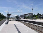 Rame n°884 en direction de Meyzieu ZI entrant en station