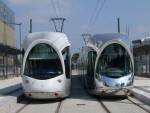 Les deux rame inaugurale en station. Au fond, un Rhônexpress
